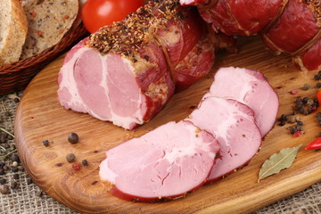 Pork bacon on a wooden table