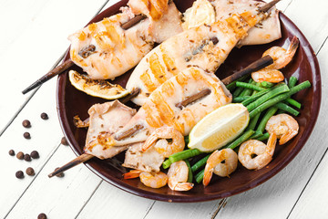 Grilled squid on a skewer