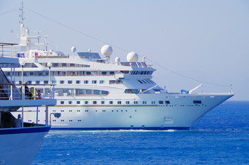 Dream vacation in the Mediterranean on cruiseship or cruise ship liner in summer with blue sky and...