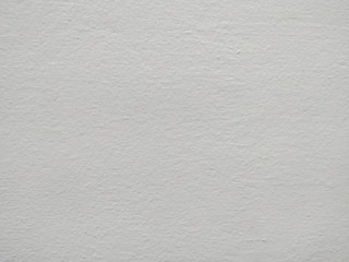 White cement wall background picture. In vintage style for graphic design or retro wallpaper.