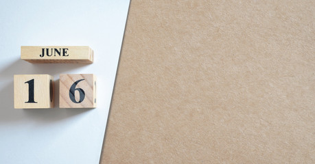 June 16, Empty white - brown background.