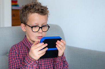 child boy playing video game