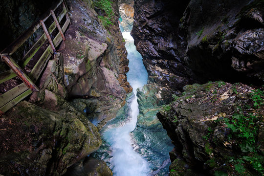 Waterfalls Stanghe (Gilfenklamm) localed near Racines, Bolzano in South Tyrol, Italy. Wooden bridges and runways lead through the canyon and give a spectacular sight to the waterfalls.