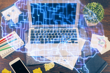 Multi exposure of work space with computer and human brain hologram. Brainstorm concept.