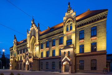 Obraz premium Modern city architecture. Night lighting of building in art Nouveau style. Riga, Latvia.