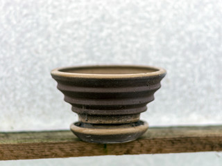 clay flower pot on white background