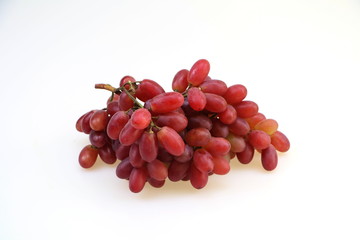 Fresh red grape, juicy, appetizing, white background