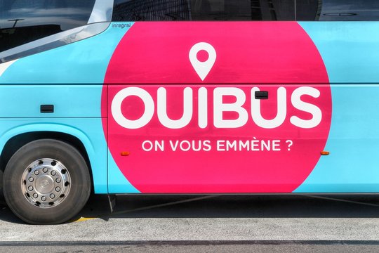 Colombier, France - July 16, 2018:  Ouibus bus at a station. Ouibus is a subsidiary of French state railways SNCF which has operated coach services in Europe since 2012