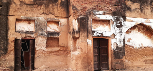 Islamabad,Pakistan,January 29,2020:Primitive arch design,ruined up walls,abandoned temple near to devastate,old building. The temple was built in 18th century situated in south Pakistan.