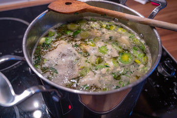 Stew with fresh vegetables cooks in a saucepan