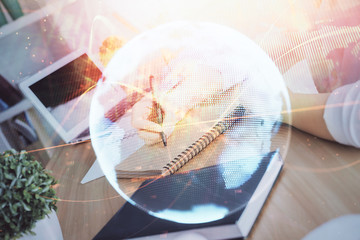 International business hud over woman's hands writing background. Concept of hard work. Double...