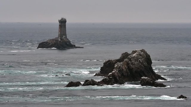 The lighthouse La Vieille in the strait Raz de Sein at the Pointe du Raz, Plogoff, Finistère, Brittany, France