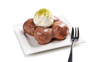 cream and chocolate puffs isolated on white background