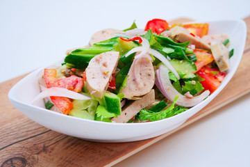 Delicious spicy vietnamese sausage salad with vegetable.