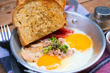Indochina pan-fried egg with pork and toppings,