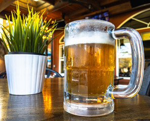 Chilled Beer Mug At the Bar