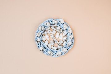Composition of Easter eggs. Easter holiday concept. Blue wreath