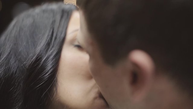 a couple in love hugs. A man and a woman look into each other's eyes. the bride and groom kiss on Valentine's day. February 14