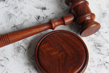 Judge's gavel on light background, top view. Law concept