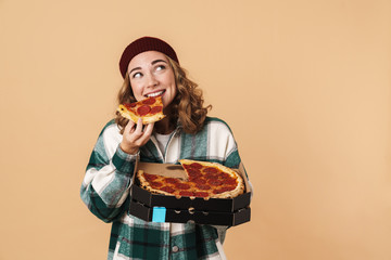 Photo of pretty happy woman smiling and eating pizza at camera