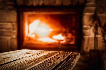 Desk of free space and home interior with fireplace 