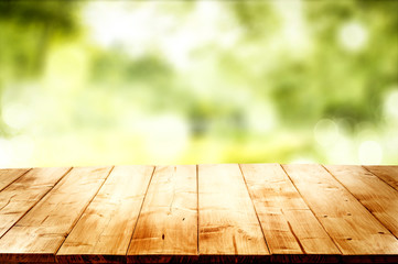 Desk of free space and blurred spring landscape 