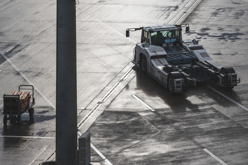 A push back tractor at a airport apron