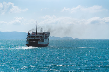 A ship/ferry at sea in the gulf of Thailand