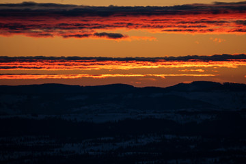 Colorful deep orange and red sky at sunrise. Background