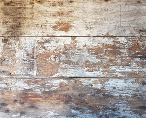 Aged dirty grunge wood background. An old brown scratchy wooden table from above with rust nail for texture and prop background 