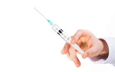 nurse hand holding syringe for virus protection. isolated on white