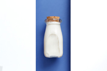 Milk on a white and blue background