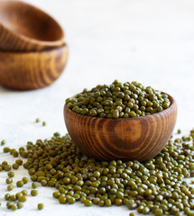 Dried mung beans in wooden bowl