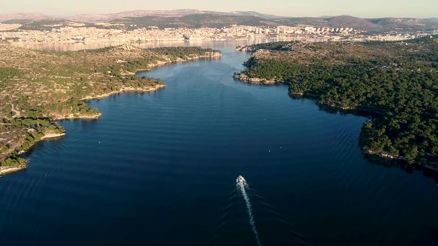 Aerial view of a boat navigating at Sveti ante canal, Šibenik, Croatia