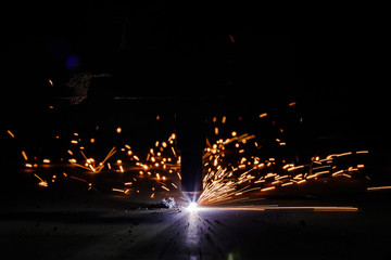 Plasma cutting of metal with a cnc. Plasma cutting machine cutting steel sheet. Laser cutter in...