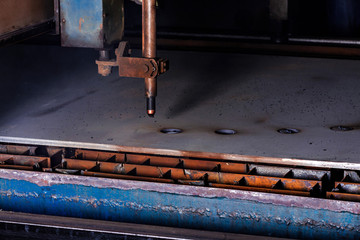 Plasma cutting of metal with a cnc. Plasma cutting machine cutting steel sheet. Laser cutter in production. Industrial metal cutting by plasma laser