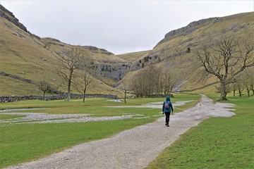 Fototapeta premium The Hiker's path to Gordale Scar, Malham, Yorkshire Dales