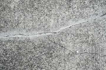 Naklejka premium cracked concrete floor texture - old road