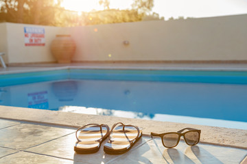 Obraz premium Tropical swimming pool on a nice hot day.