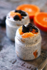 Chia yogurt with fruits and chocolate. Healthy breakfast or dessert. Diet concept.