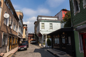 Naklejka na ściany i meble Narrow street in Istanbul's historic district. Turkey