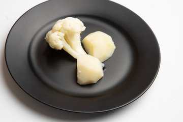 cooked cauliflower dish with potatoes