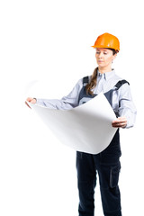 An engineer builder is studying blueprints for building construction or repair. Isolated