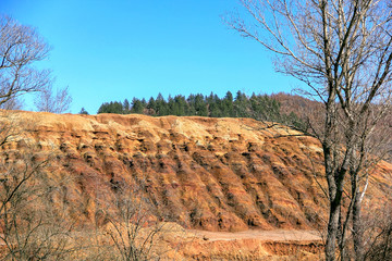 The old tailings Trepca's in Zvecan and eagle on the top, Canyon in Kosovo