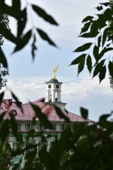 Fototapeta premium bell tower of the Orthodox Church with a Golden weather vane