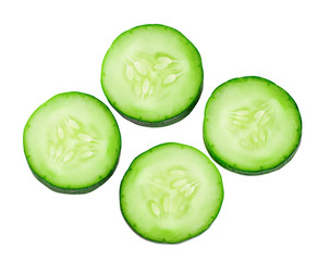 Sliced cucumber isolated on a white background.