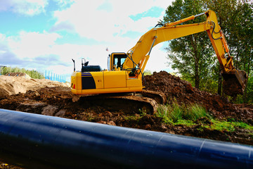 excavator digging ground construction