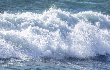 Beautiful forms of sea foam during a storm