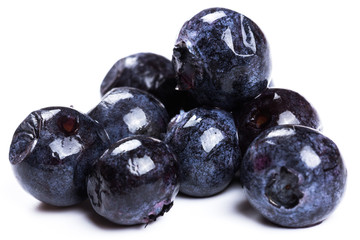 a handful of blueberries close-up isolated on white background