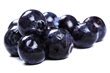 a handful of blueberries close-up isolated on white background